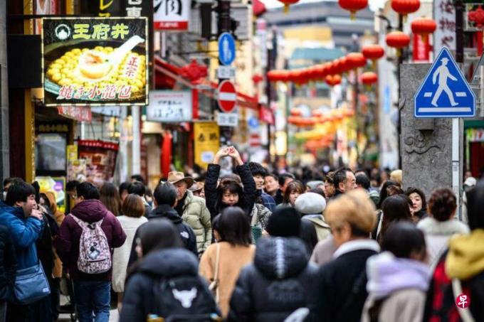 中国称将认真研究日本各界希望恢复免签诉求