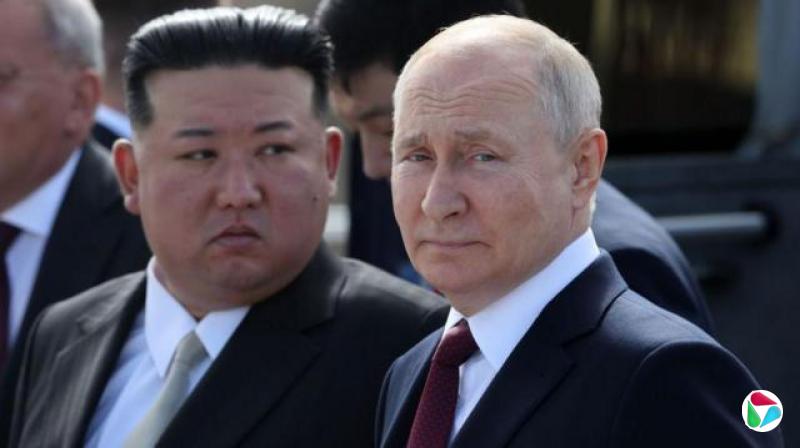 特写照片中,朝鲜领导人金正恩与俄罗斯总统普京并肩而立。