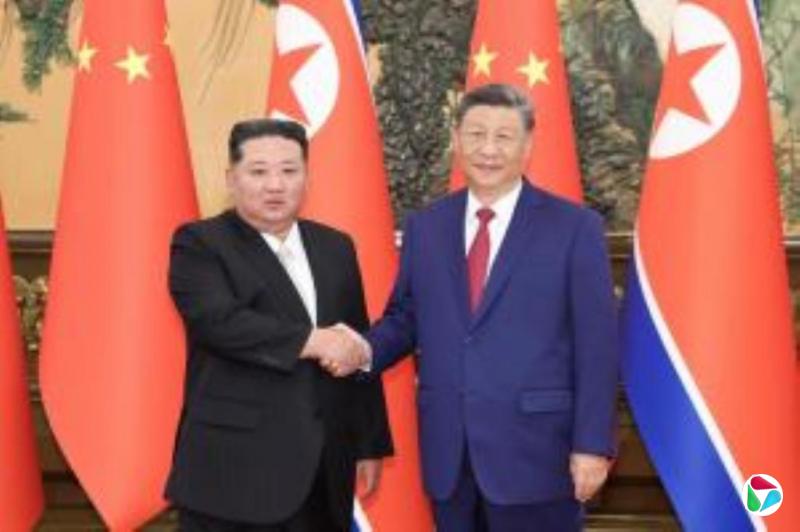习近平向金正恩致贺电强调愿同朝密切交往合作