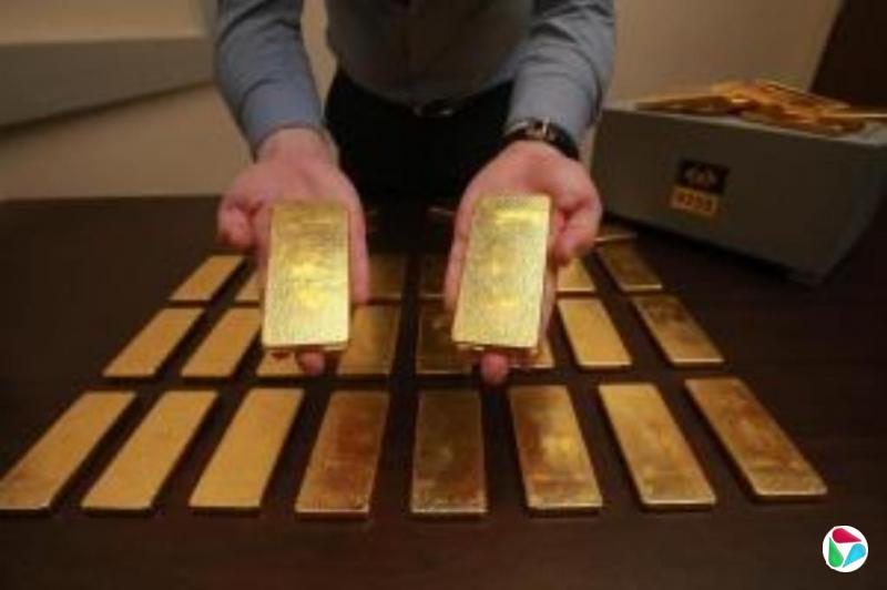 中国多家银行提高购金门槛并提示风险