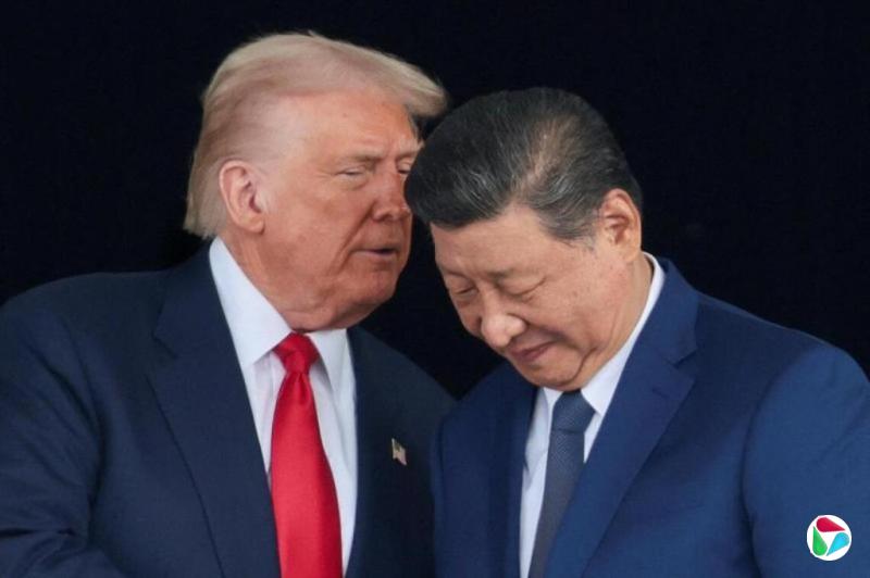 侧记:拍背耳语 “习特会”稳定中美关系