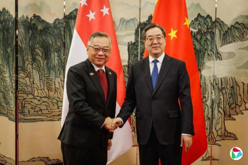 颜金勇与中国副总理丁薛祥进行双边会谈