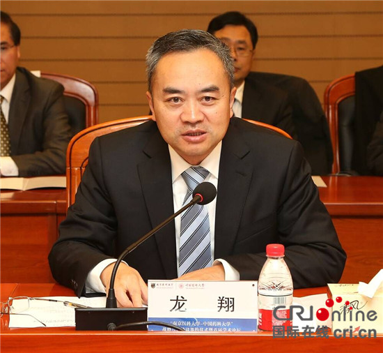 龙翔被诉:贪污数额特别巨大、受贿数额特别巨大